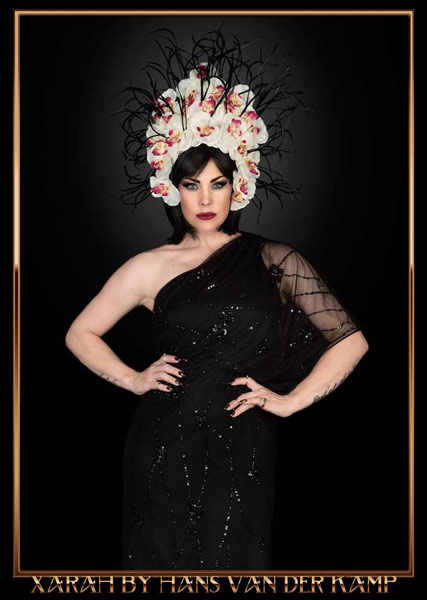burlesquedancer Xarah von den Vielenregen is glitzy elegant black dress and beautiful flower headdress, taken by Hans van der Kamp in Amsterdam, NEtherlands