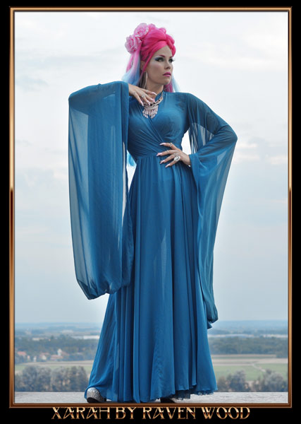 Xarah in blue kimono dress and pink hair. A dark pastelgoth fantasy cosplay barbie with the grace of a vintage glamour showgirl. Taken b Raven Wood in Regensburg, Germany